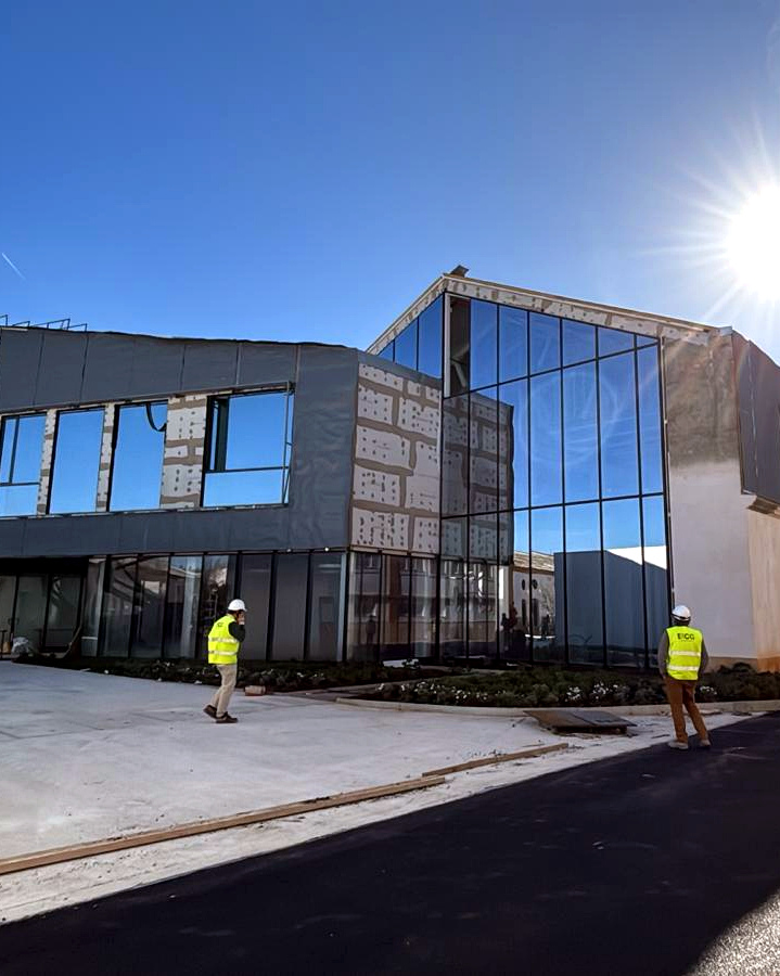 BICG team outside an energy-efficient building
